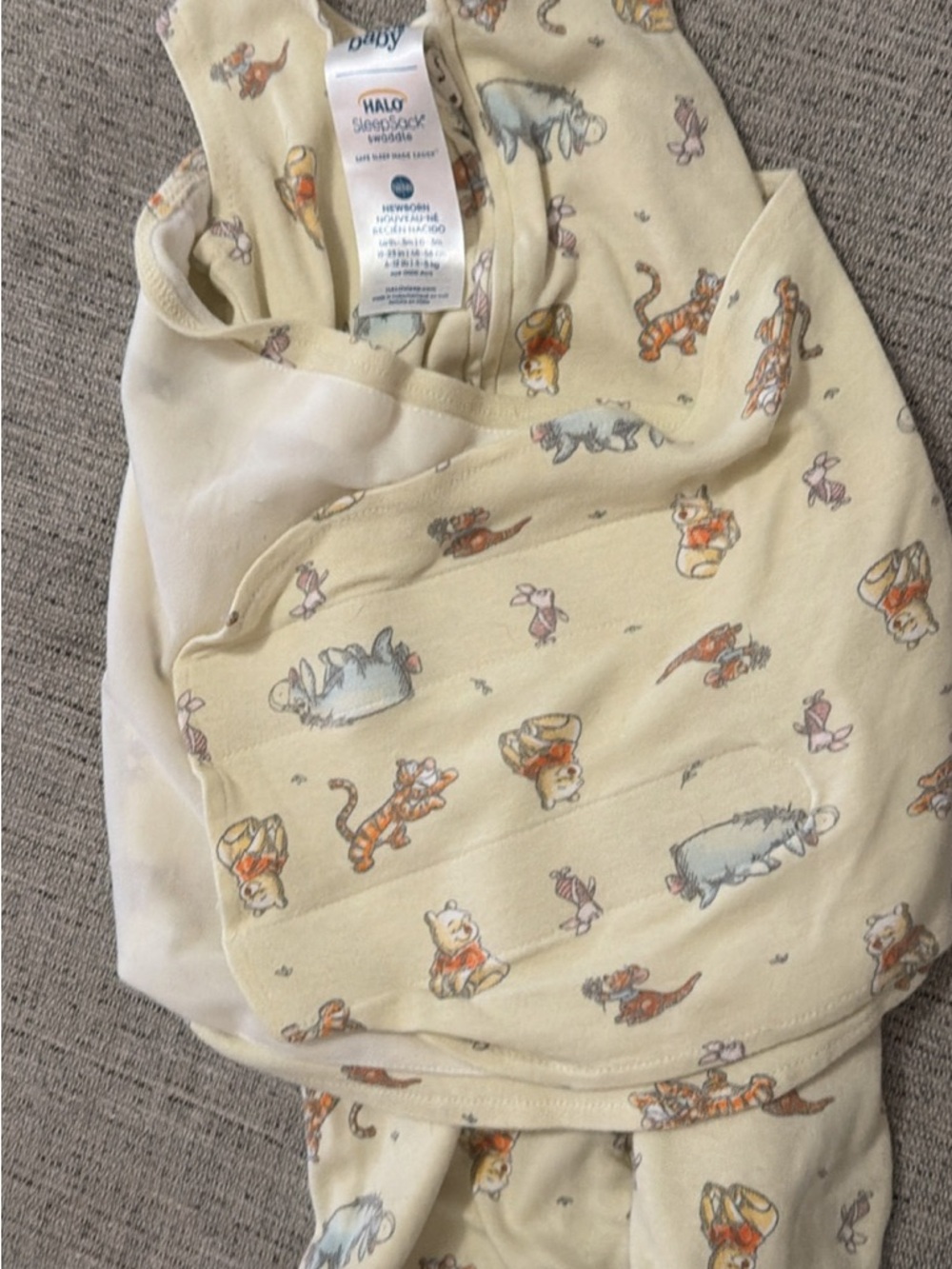 Halo SleepSack Swaddle in Pale Yellow with Winnie the Pooh Characters